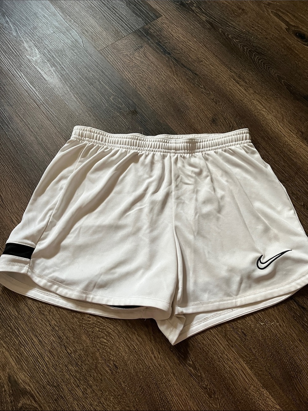 Nike White Women's Athletic Shorts with Black Swoosh Accent